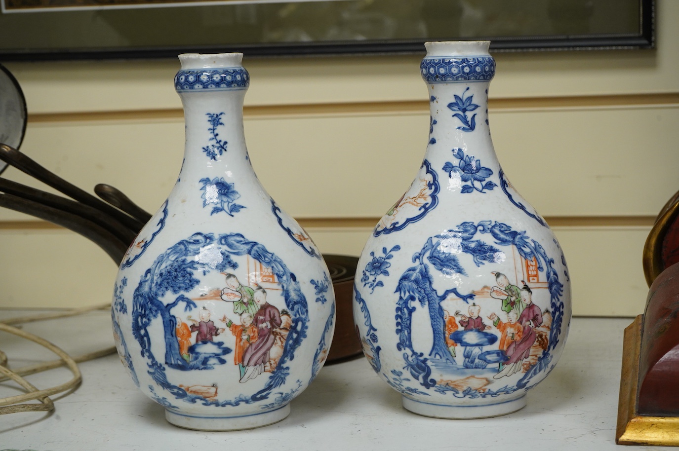 A pair of late 18th century Chinese export Mandarin guglets drilled, 24cm high